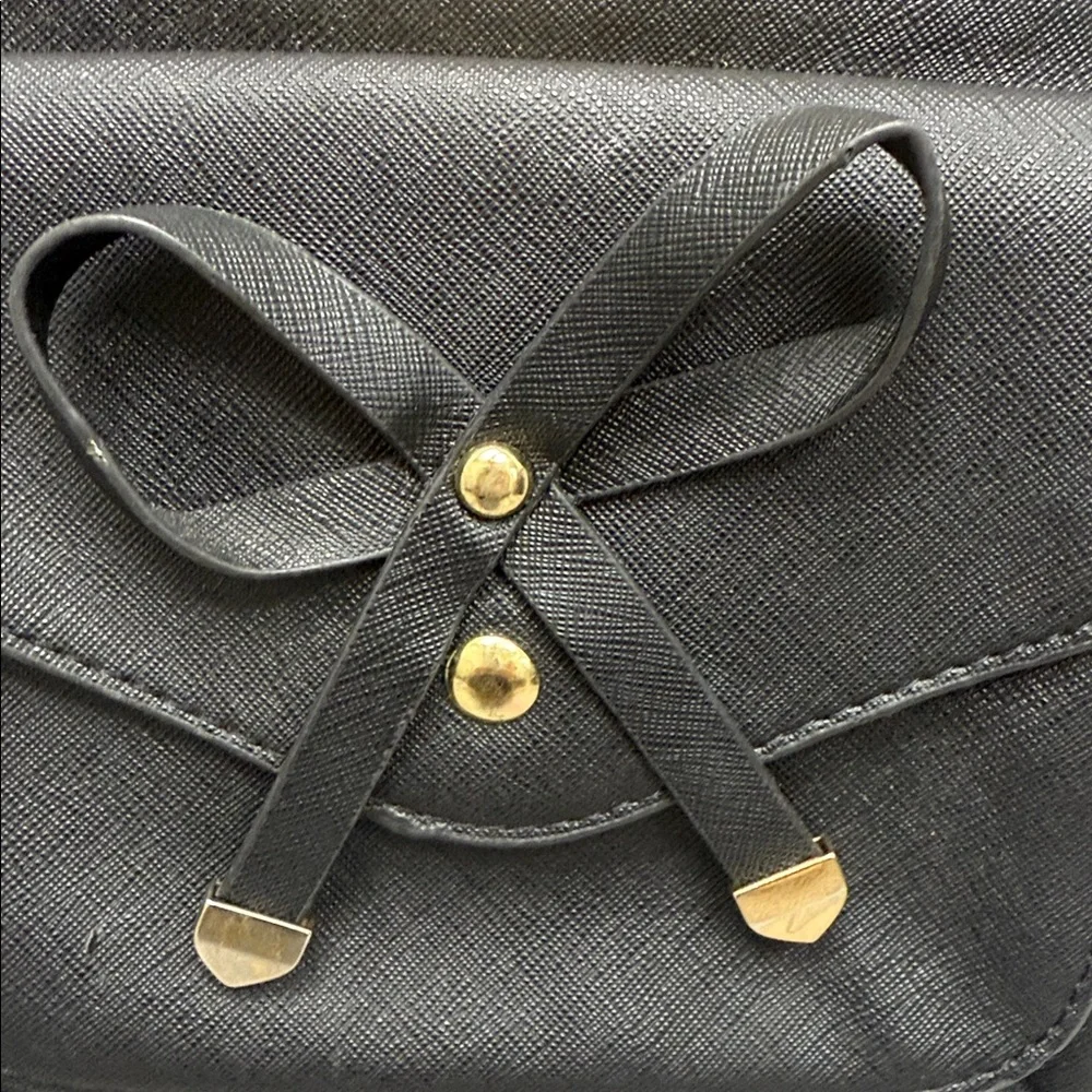 Black Backpack with Gold Accents